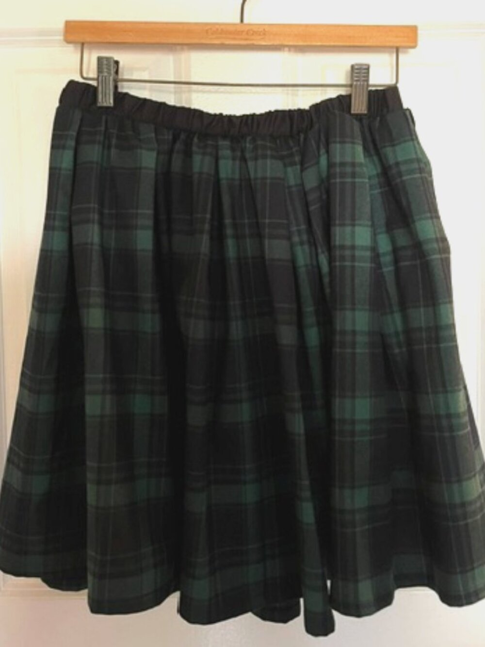 Black watch plaid dirndl skirt with elastic waistband, no tag.